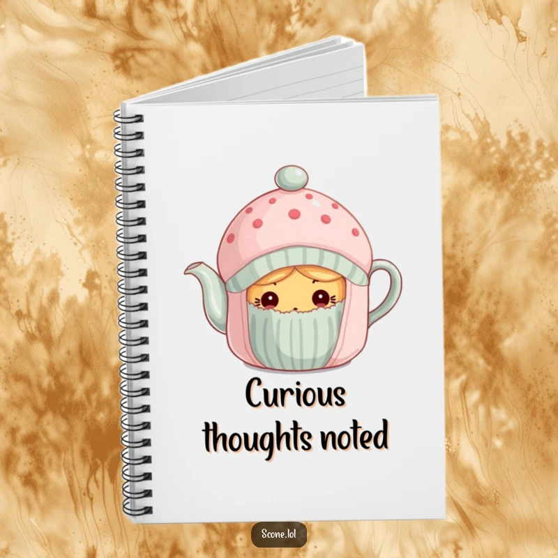 Funny scone curiously peeking from under a tea cozy on a notebook cover, ideal for writing and ideas.