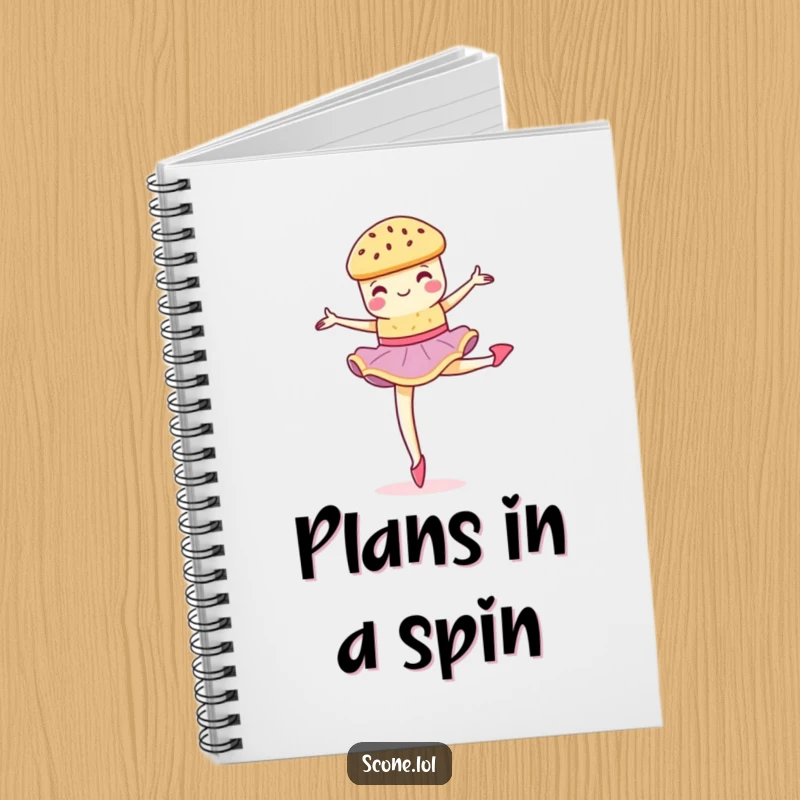 Funny scone performing a graceful, crumbly pirouette on a notebook cover, ideal for writing and sketching.